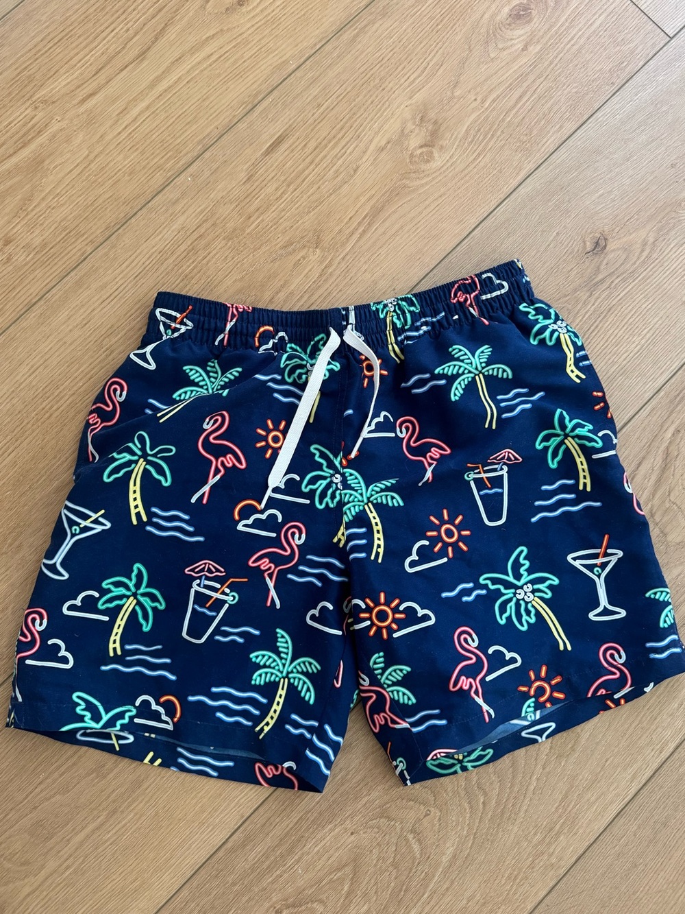 CHUBBIES Navy Swim Shorts with Multicolor Tropical Details